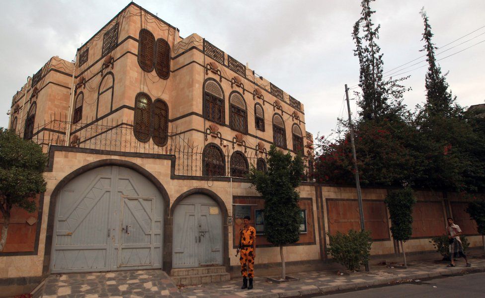 A Yemeni soldier stands guard in front of the Iranian embassy in Sanaa, on July 21, 2013
