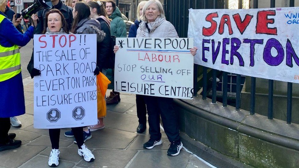 Protestors outside the full council meeting at the town hall