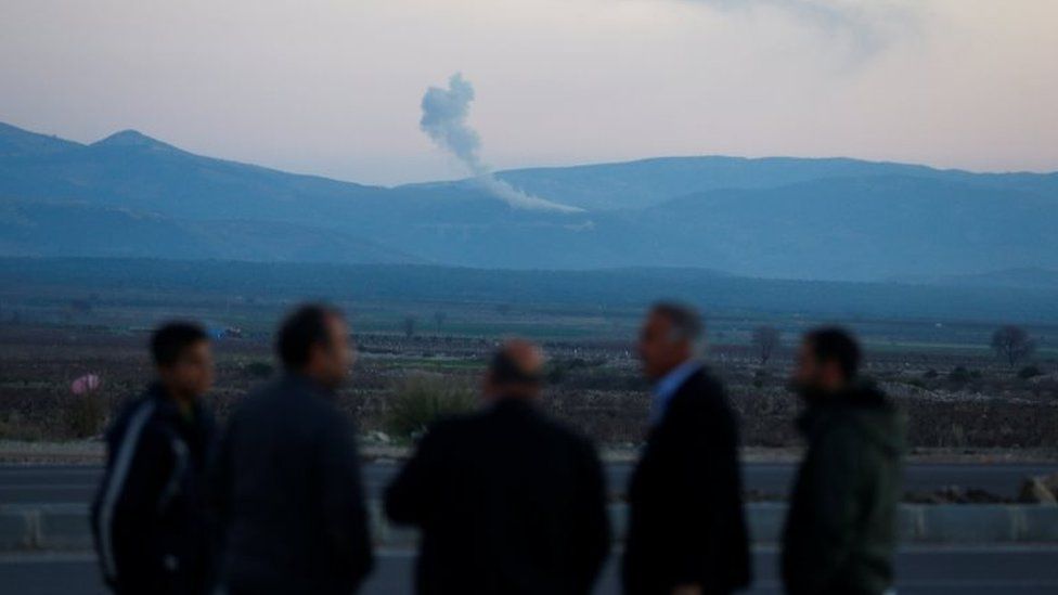 Smoke rises from the Syria's Afrin region, as it is pictured from near the Turkish town of Hassa, on the Turkish-Syrian border in Hatay province, Turkey on 20 January 2018