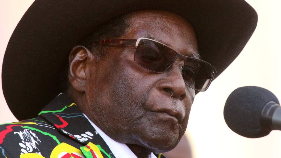 Robert Mugabe addresses supporters of his ruling ZANU (PF) party gathered for a rally in Chinhoyi