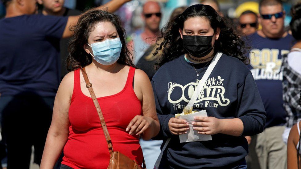 Women wearing face coverings in LA