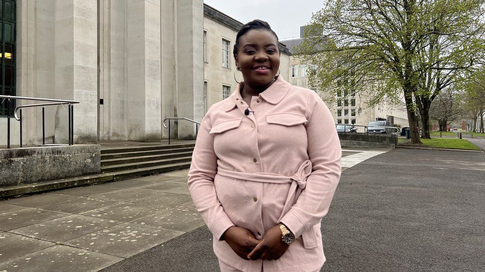 Evelyn standing in from of the Temple of Peace in Cardiff