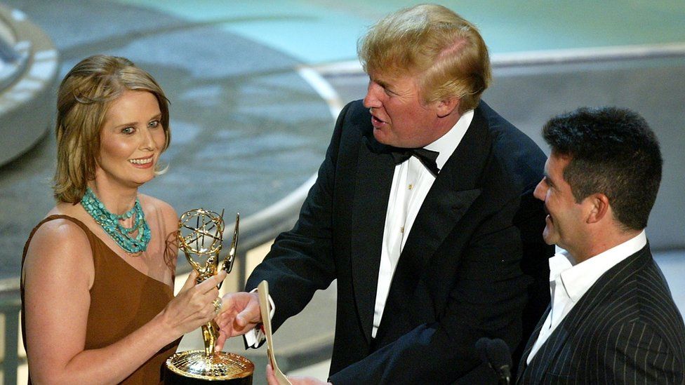 Actress Cynthia Nixon accepts her Emmy from Donald Trump in September 2004 in Los Angeles, California