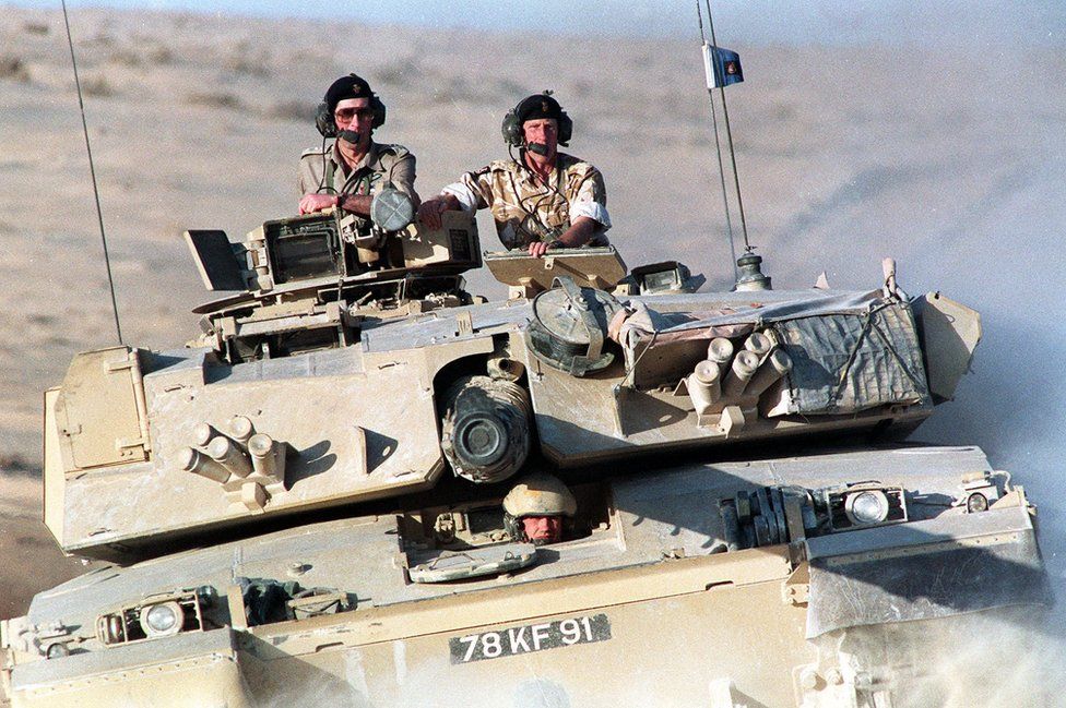 Prince of Wales (left) riding in a Challenger tank of the Royal Scots Dragoon Guards (7th Armoured Brigade) with Brigadier Patrick Cordingley