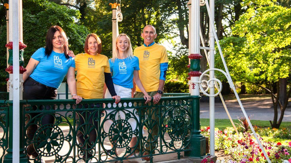 Swindon Welcomes Ukraine group standing in gazebo