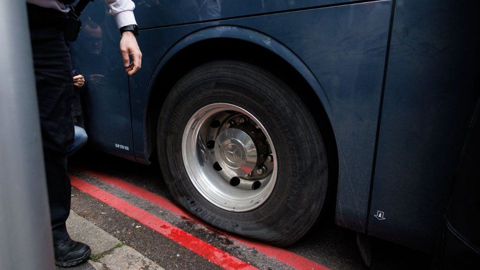 A flat tyre on the coach
