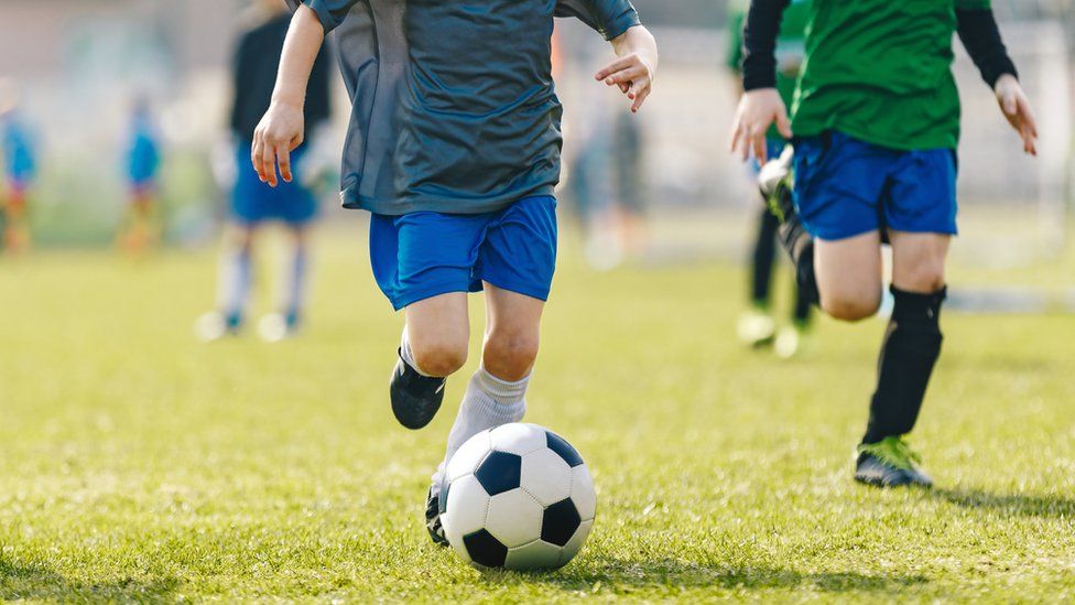 Children playing football