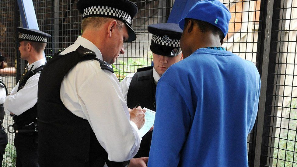 Metropolitan Police officers set up a stop and search operation