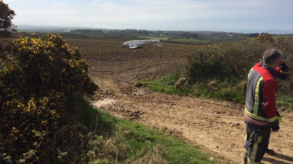 Light aircraft in field in Cornwall