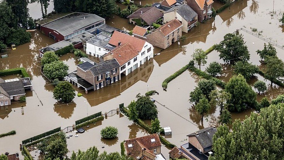 An aerial view of Valkenburg shows the flooded area around the Meuse