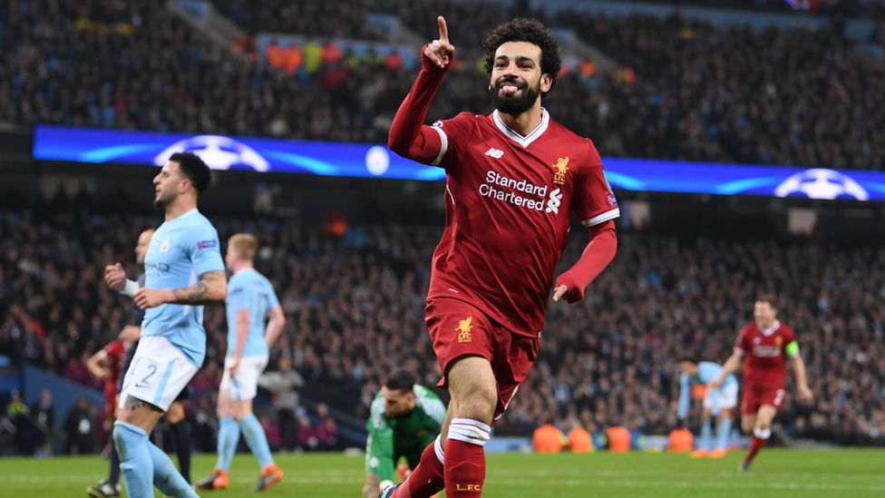 Mohamed Salah of Liverpool celebrates scoring the first goal during the Quarter Final Second Leg match between Manchester City and Liverpool at Etihad Stadium on April 10, 2018 in Manchester, England.