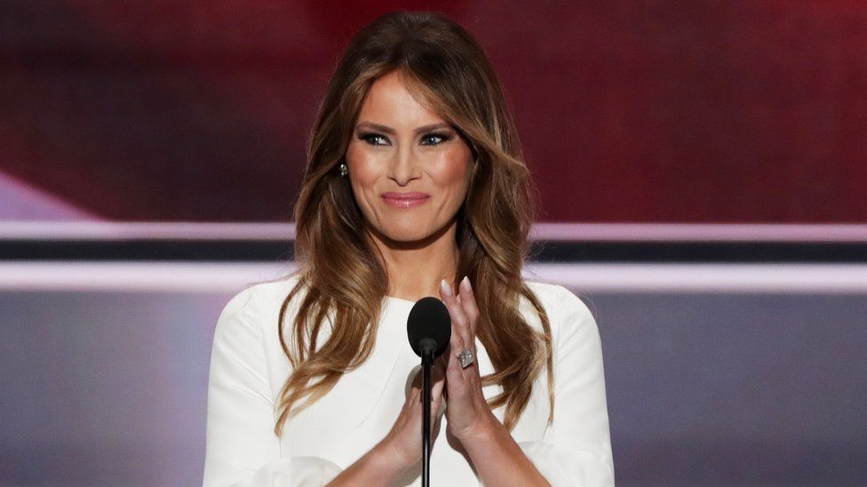 The advert shows Melania Trump in front of a microphone in a pale dress, like the one she wore to the Republican National Convention in 2016