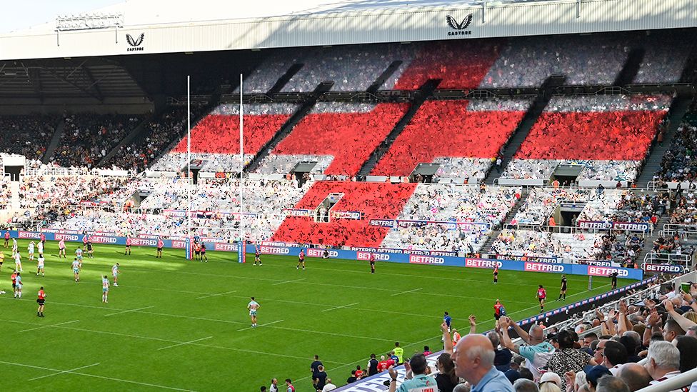Artist impression of rugby fans watching World Cup game and forming giant St George's flag at St James' Park