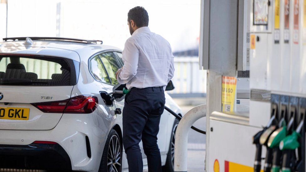 Man fuelling car