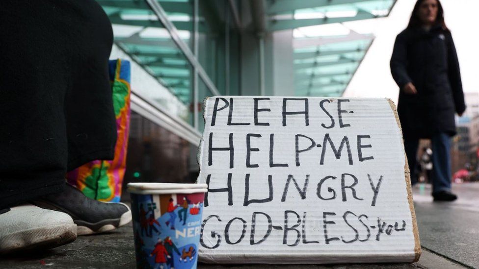 Photo of a homeless person's sign
