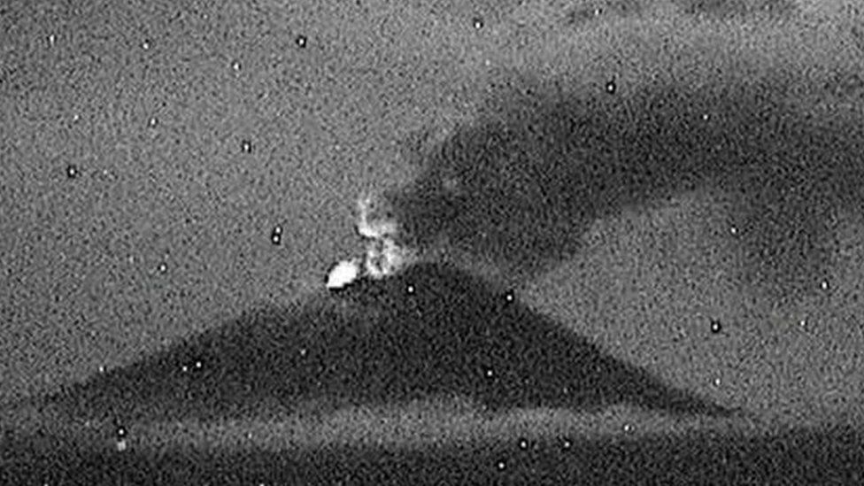 Night-time shot of the ash cloud of the Popocatépetl volcano