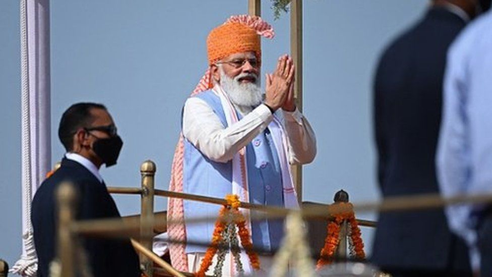 India's Prime Minister Narendra Modi gestures after addressing the nation from the ramparts of the Red Fort during the celebrations to mark countrys 75th Independence Day in New Delhi