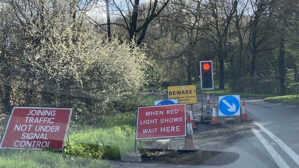 Temporary lights and signage on A30