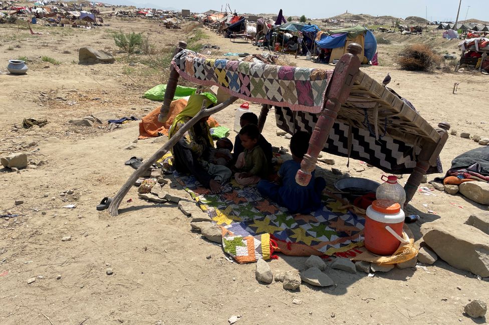 Displaced families in makeshift shelters in Lalbagh, Sindh province