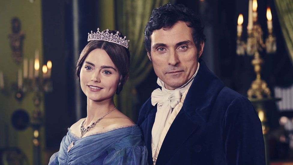 Jenna Coleman with Rufus Sewell in a publicity shot for Victoria