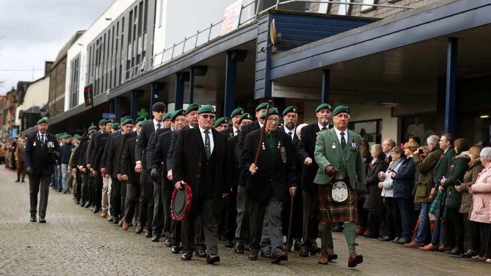 Veterans take part in a remembrance parade and service in Fort William