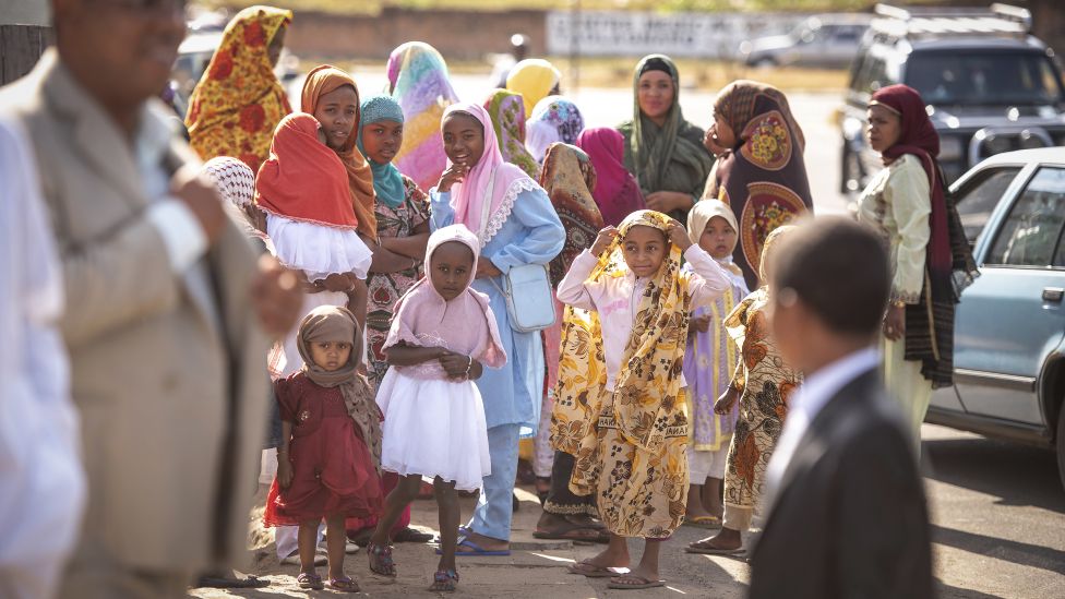 Young and old in their best clothing after Eid prayers in Fort Dauphin, Madagascar