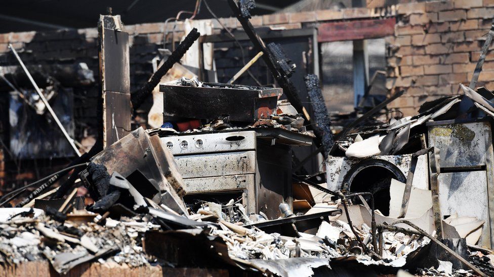 General view of a destroyed home whitegoods following bushfire damage on November 13