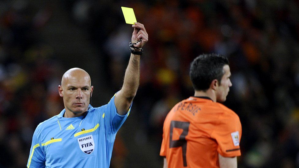 Robin van Persie of Netherlands gets yellow card during 2010 World Cup final