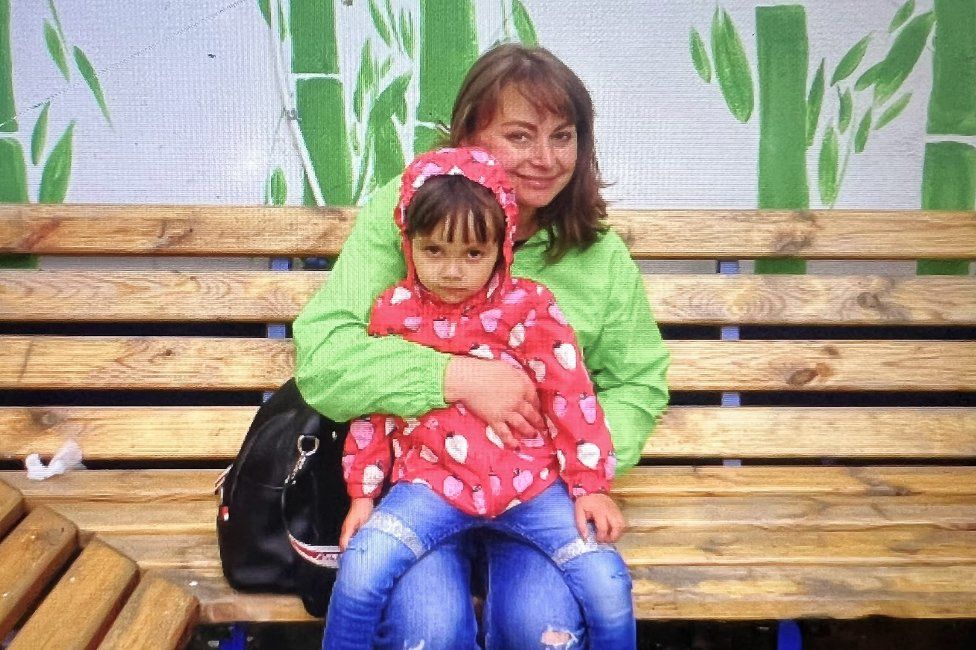 Oksana Litvynyenko with her daughter. Oksana was badly wounded in April and died on Sunday. (Family handout)