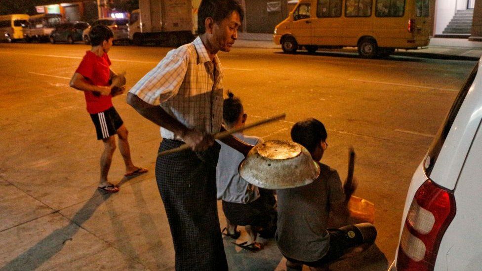 Residents bang pots and pans in Yangon