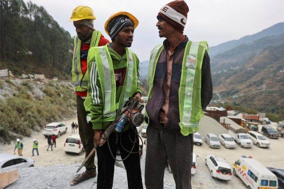 Rat miners" stand before they begin manual drilling as rescue operations are in progress after workers got trapped in a collapse of an under-construction tunnel, in Uttarkashi in the northern state of Uttarakhand, India, November 27, 2023.