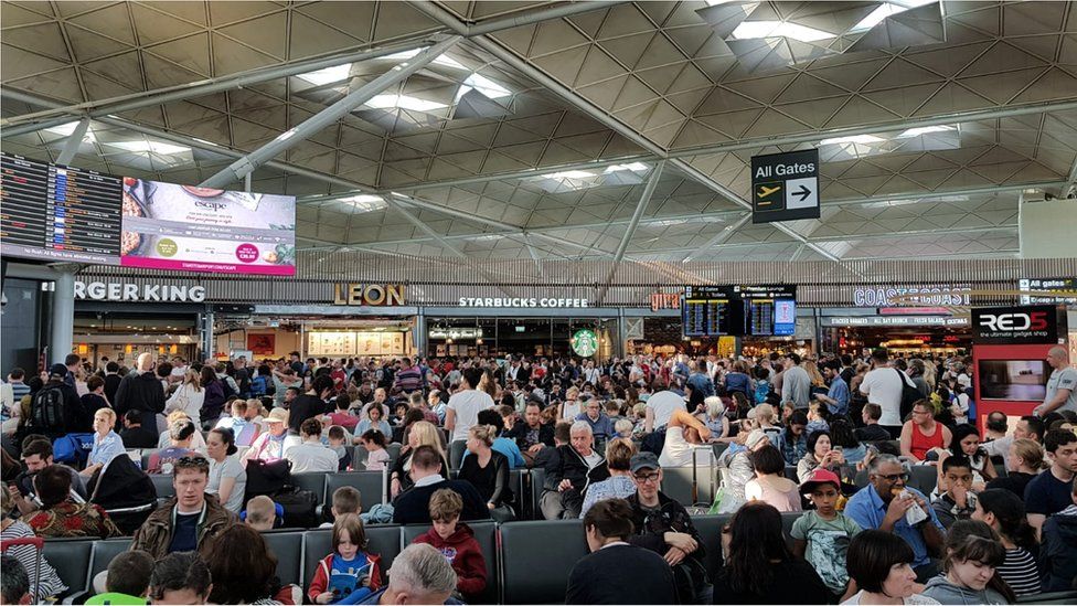 Passengers waiting at Stansted