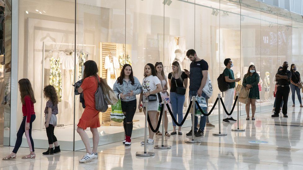 Shoppers queue in Westfield Shopping centre on June 15, 2020 in London, England.