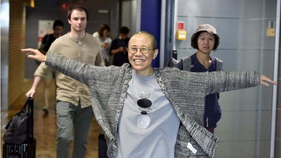 Liu Xia, the widow of Chinese Nobel Peace Prize-winning political dissident Liu Xiaobo, gestures as she arrives at the Helsinki International Airport in Vantaa, Finland, July 10, 2018.