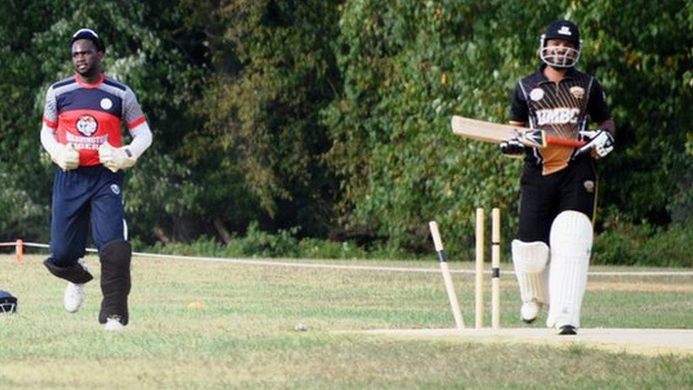 Imran Awan takes a wicket