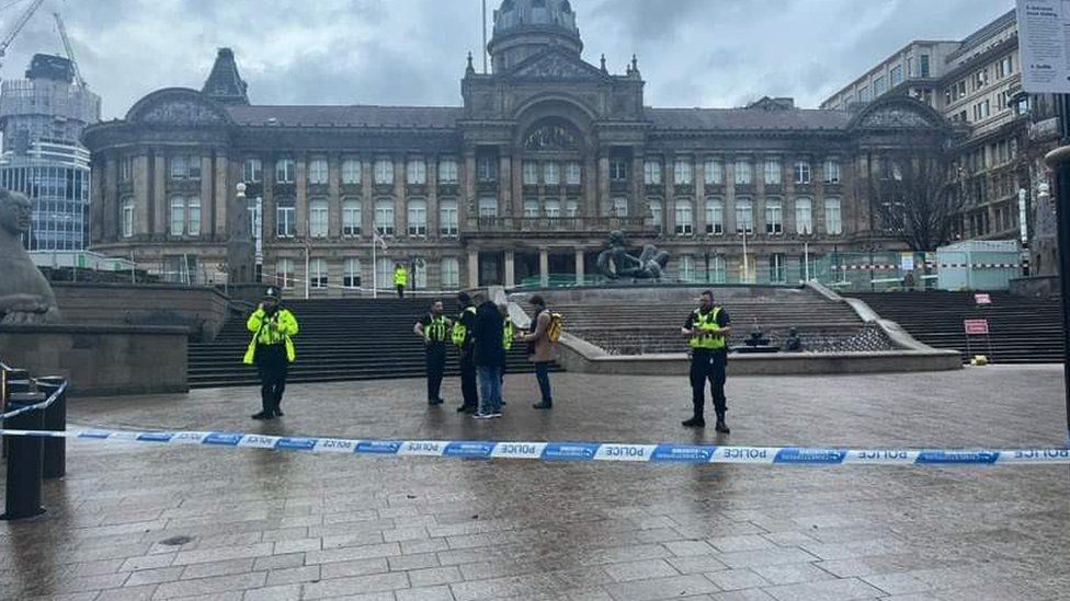 Uniformed police officers at the scene in Victoria Square
