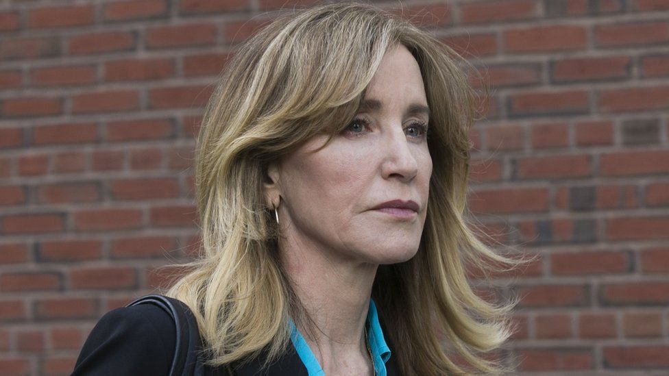 US actress Felicity Huffman leaves court in Boston, Massachusetts, on 3 April 2019