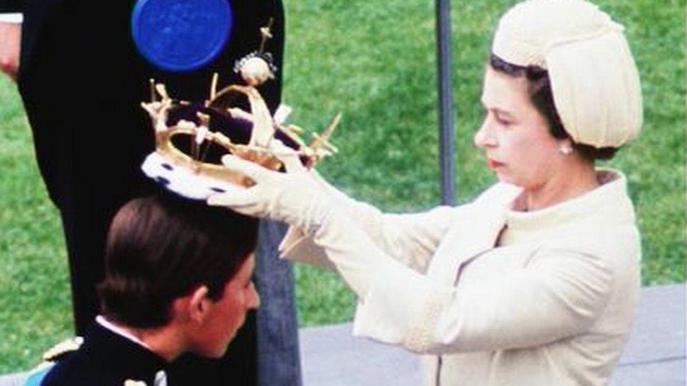 The Queen places a crown on Prince Charles' head at his investiture in 1969