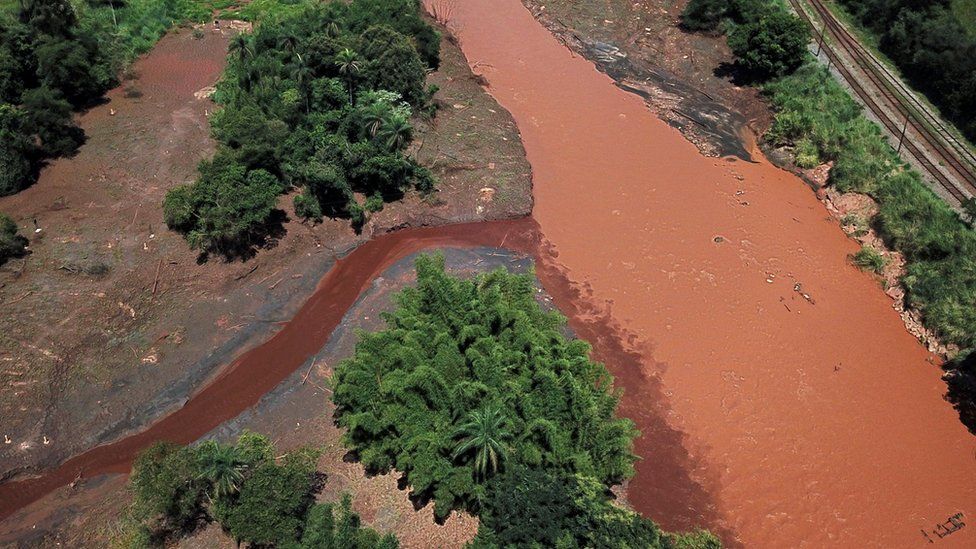 Mud reaches the Paraopeba river in Brumadinho, Minas Gerais state, Brazil on March 18, 2019, after the collapse of a dam at an iron-ore mine belonging to Brazil's giant mining company Vale on January 25, 2019