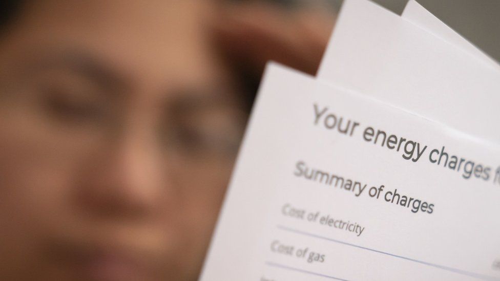 Person looking at energy bills