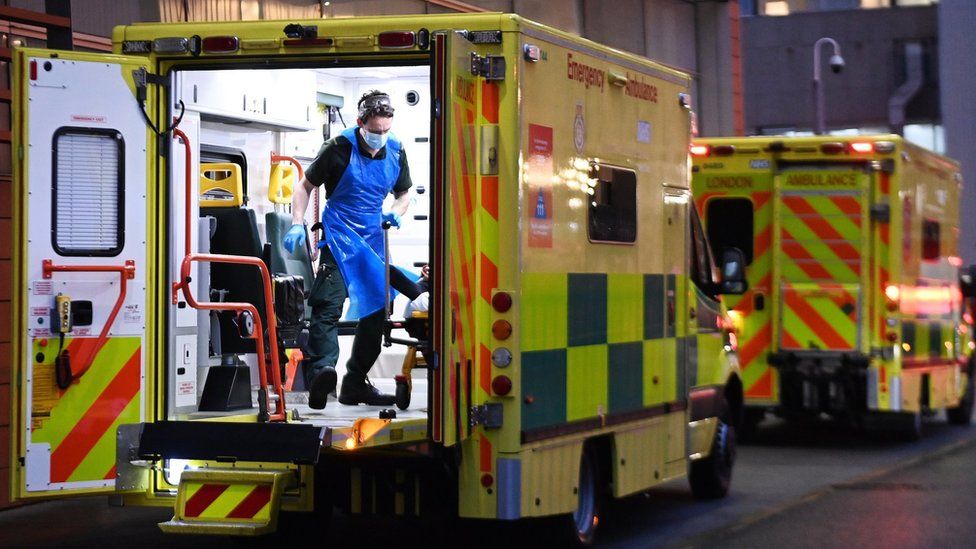 NHS Ambulance staff outside the Royal London hospital in London