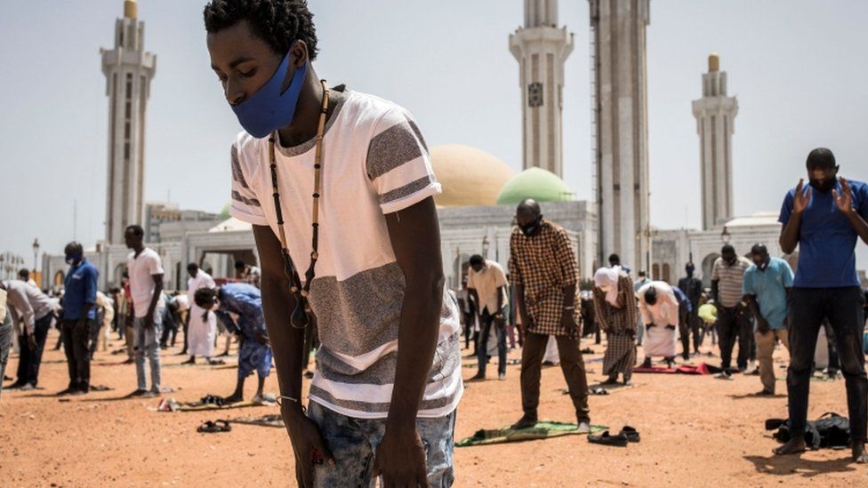 Muslim worshippers outside a mosque in Dakar, Senegal - Friday 15 May 2021