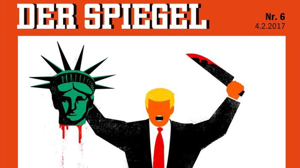 Der Spiegel cover shows a cartoon of Donald Trump in a suit, with no nose or eyes, holding the severed head of the statue of liberty in his right hand and a large, bloodied knife in his left hand. Written alongside are the words: America First.