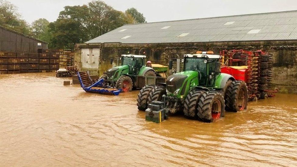Tractors in flooding
