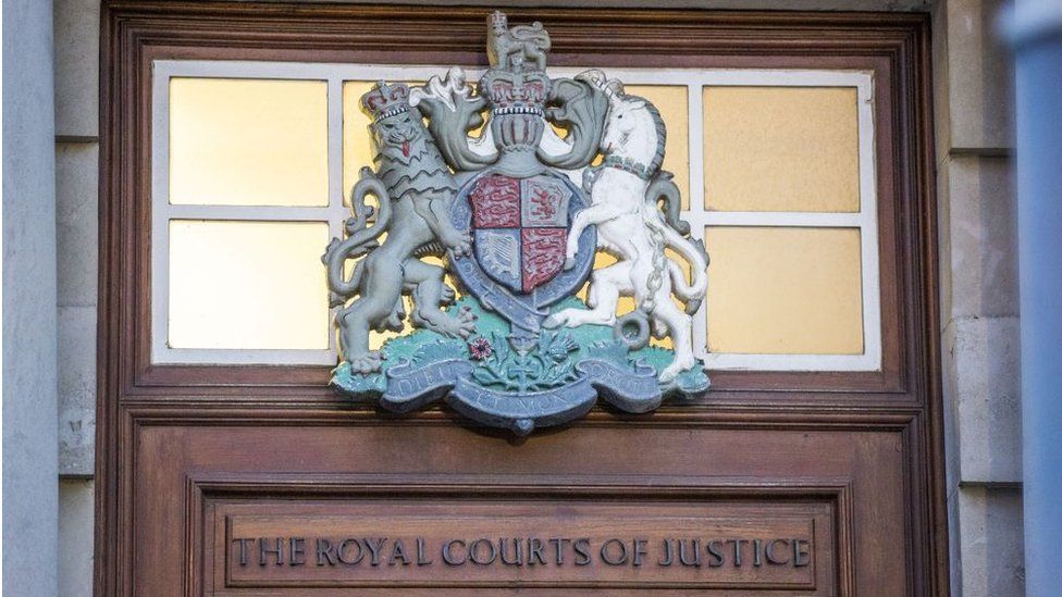 The crest of the Royal Courts of Justice where the High Court and the Court of Appeal sit in Belfast