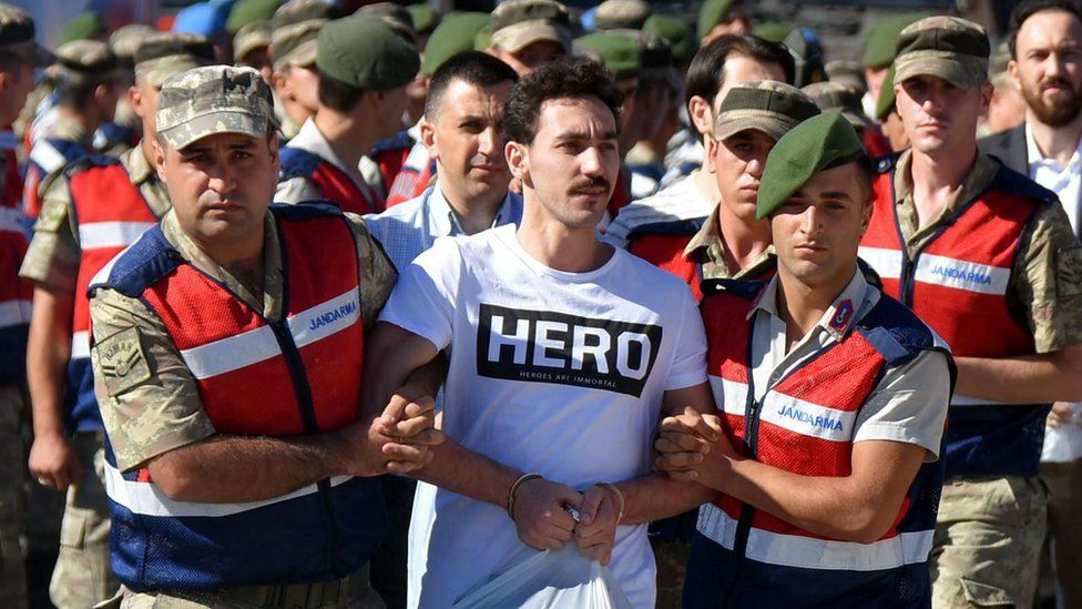 Prisoner in "Hero" T-shirt, Mugla, 13 Jul 17