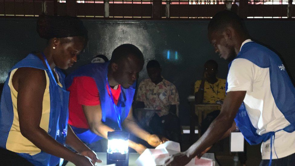 People counting votes in the capital of Monrovia