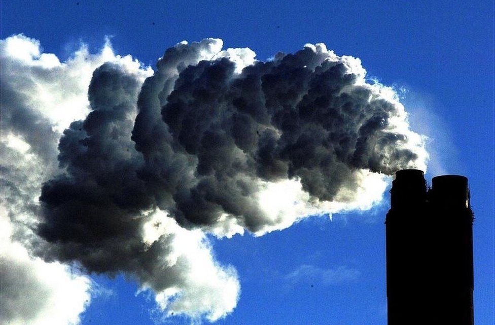 Smoke billowing from a power station