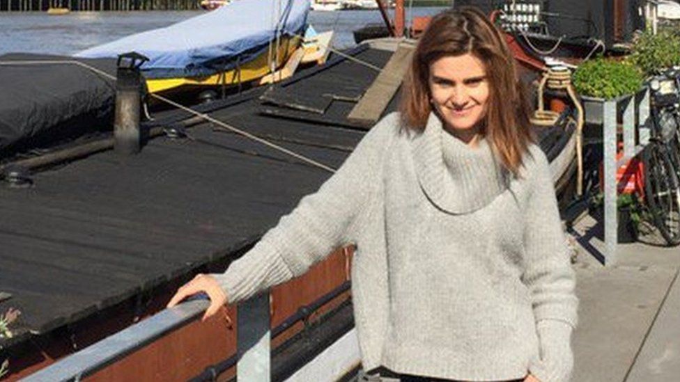 Jo Cox by her houseboat