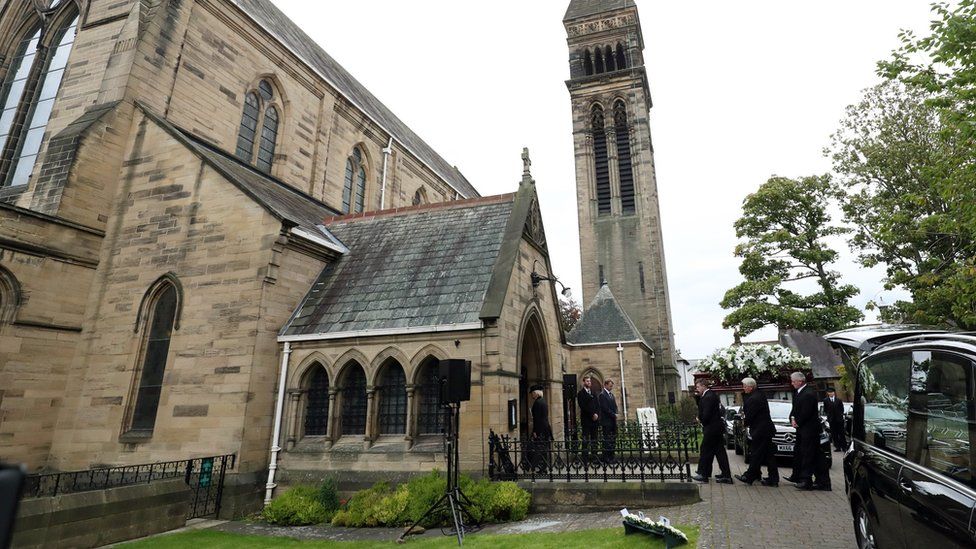 Mr Shepherd's coffin is carried into St George's Church
